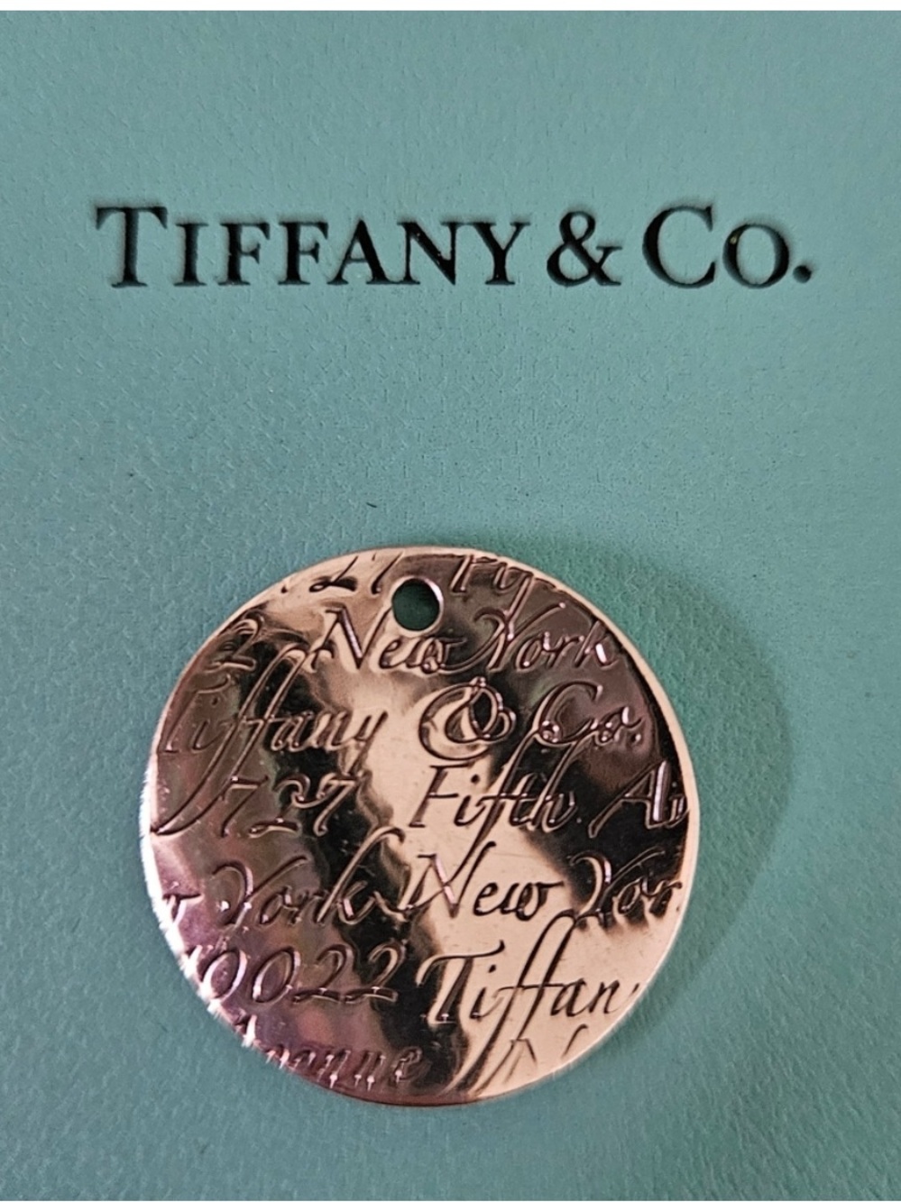 Tiffany & Co. Silver Engraved Pendant with gift bag and box